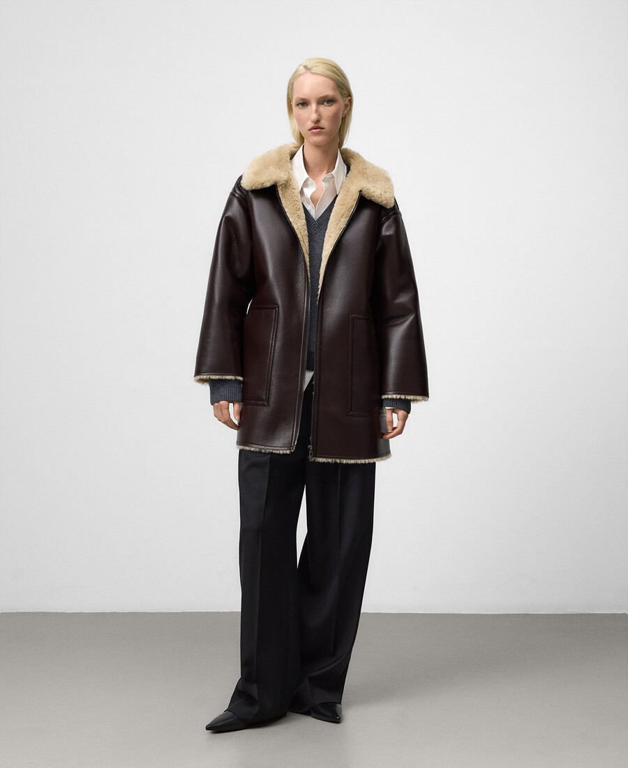 cappotto donna con cerniera in pelle e non pelle
