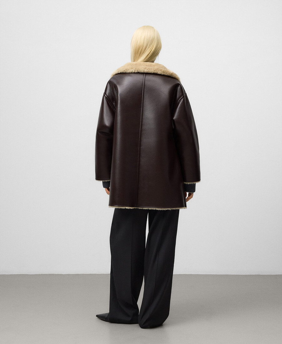 cappotto donna con cerniera in pelle e non pelle