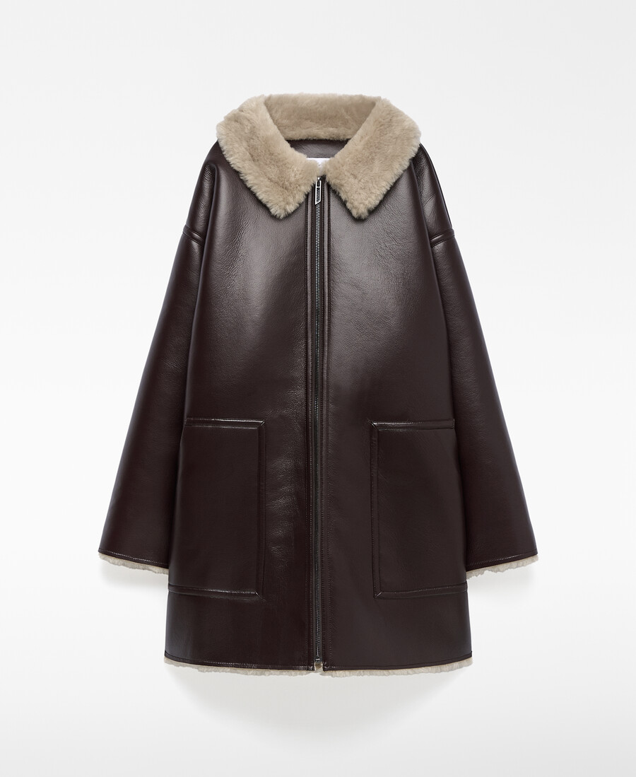 cappotto donna con cerniera in pelle e non pelle