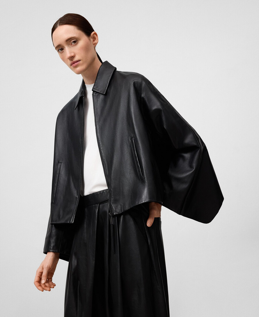giacca in pelle con mantello posteriore donna